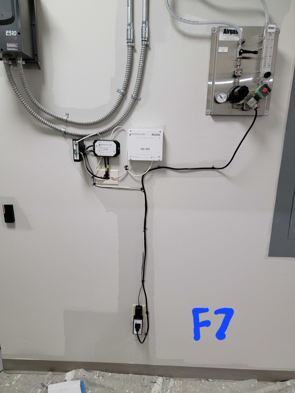 Agrowtek controller wired alongside a VFD and gas monitoring panel