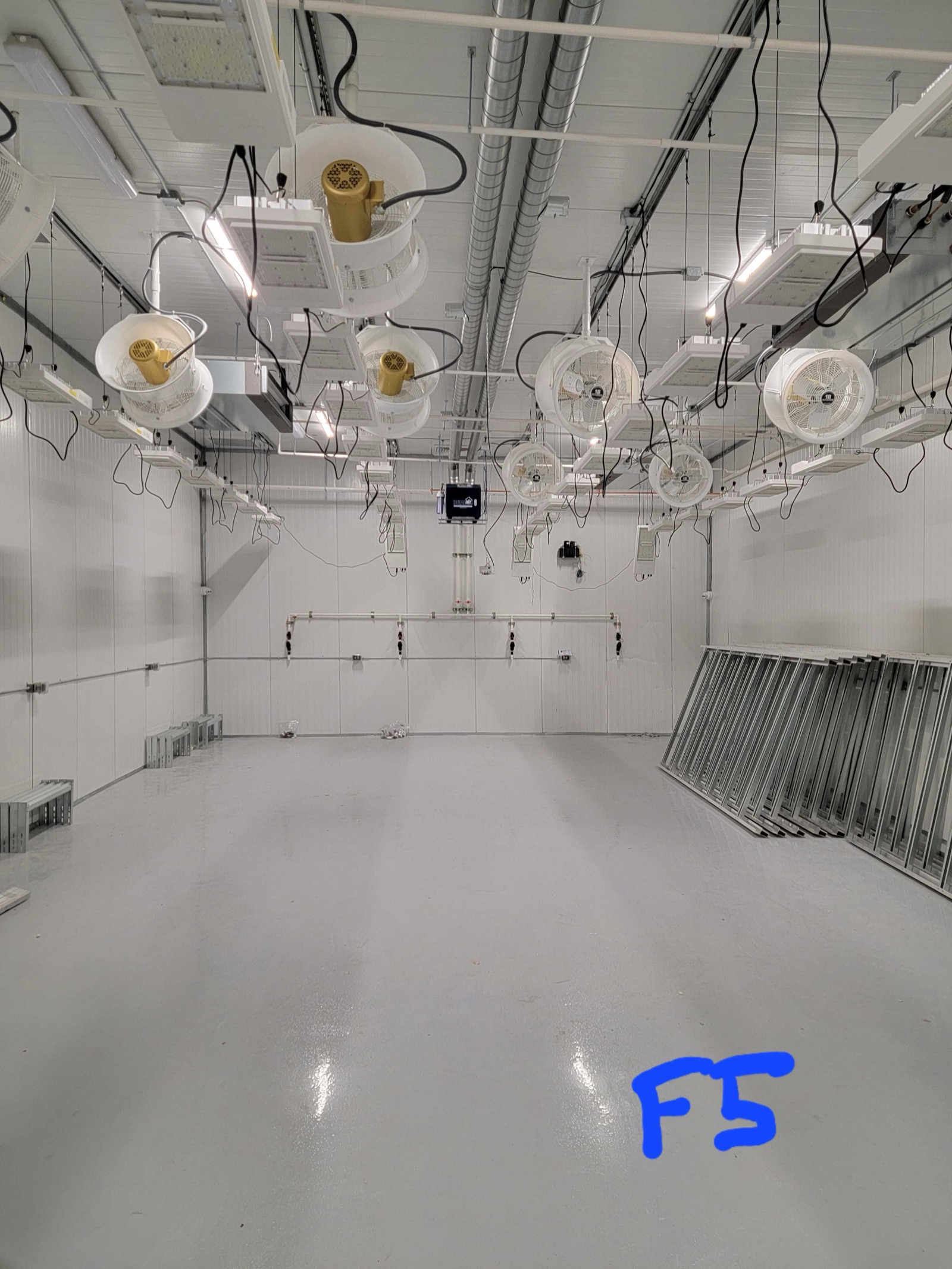 Second grow room with lighting, fans, and control wiring in place